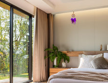 Load image into Gallery viewer, Violet Crown Chakra Dreamcatcher hanging above bed