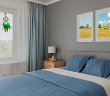Load image into Gallery viewer, Green Heart Chakra Dreamcatcher hanging in the bedroom window