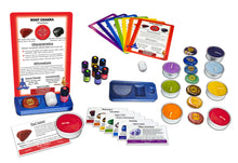 Load image into Gallery viewer, Chakra Healing Altar and Meditation Kit (41 pc): 7 Engraved Chakra Symbols Stones, 7 Chakra Healing Cards, 7 Essential Oil Blends, 8 Scented Candles, 7 Stone ID Cards, 1 Selenite Crystal, 1 Chakra Diagram, 1 velvet pouch, 1 Altar Base, 1 instructions