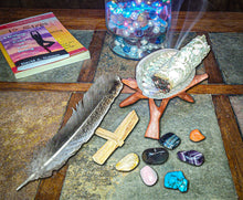 Load image into Gallery viewer, 23 Pc Ultimate Smudging and Cleansing kit with 3 white sage bundles, 2 palo santo sticks, 7 Unique Chakra Stones, 7 Chakra Stone ID Cards, 1 abalone shell with tripod stand, 1 feather and 1 (12) page instruction booklet.