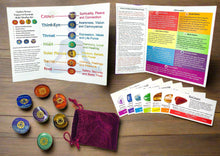 Load image into Gallery viewer, Chakra colored palm stones with engraved chakra symbols, along with stone ID card, velvet pouch, and sheet with affirmations and meditation