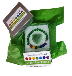 Green aventurine heart and chakra bracelet in jewelry box with green tissue paper, information card and lid